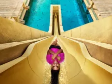 Girl riding leap of faith waterslide at Aquaventure Dubai