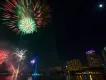 Downtown Orlando Fireworks in the sky bursting over Downtown Orlando high rise buildings.