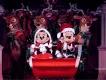Mickey’s Most Merriest Celebration Mickey and Minnie in Santa outfits on a sleigh in front of reindeer