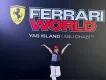 Ferrari World Yas Island, Abu Dhabi Girl stood in front of Ferrari World sign which has black background, red and white text and the Ferrari logo next to the name.