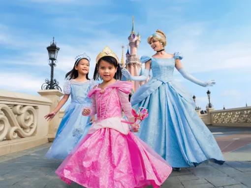 Princesses in front of Disneyland Paris castle