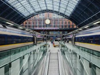 Eurostar Train station with two Eurostar trains parked on either platform.